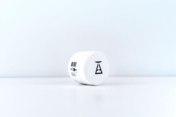 Wax coiffante ARTISTIK, pot couché et mentions produit